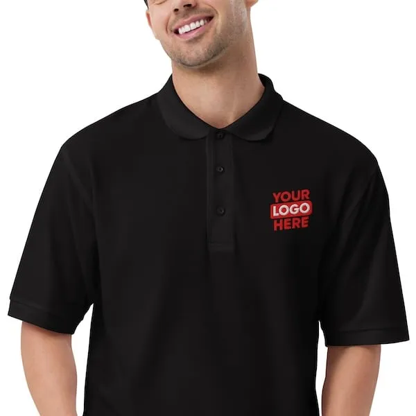 Happy man wearing a corporate polo shirt that has been embroidered with a company logo to represent products available in New York City and the surrounding the Big Apple.